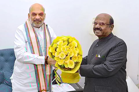 Amit Shah meets CV Ananda Bose